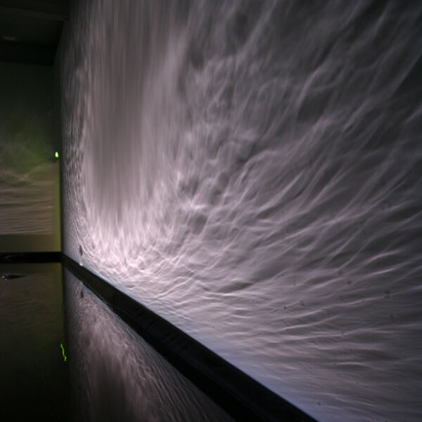 From Elizabeth Ogilvie's exhibition in DCA Galleries. Large screens use video and light to create water-like effects. The rest of DCA Gallery is lit with very low lighting.