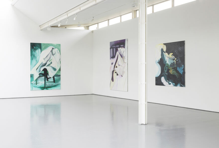Installation view of Gallery 1 with bright natural light and white walls. We can see three paintings at a distance. The paint strokes are bold and broad.
